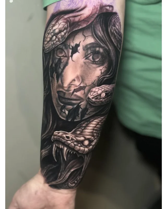 Iron Palm Tattoos & Body Piercings's work 1